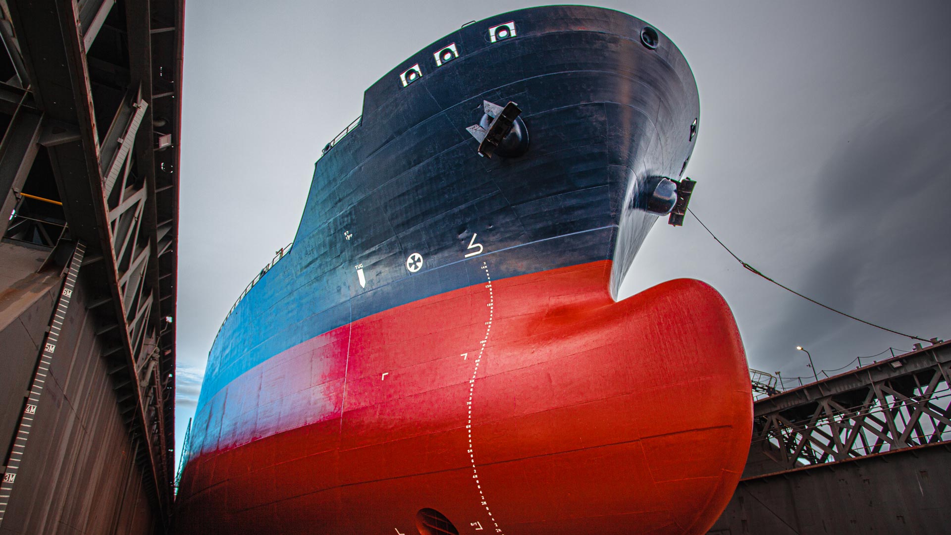 Close up on a huge transport ship in the shipyard