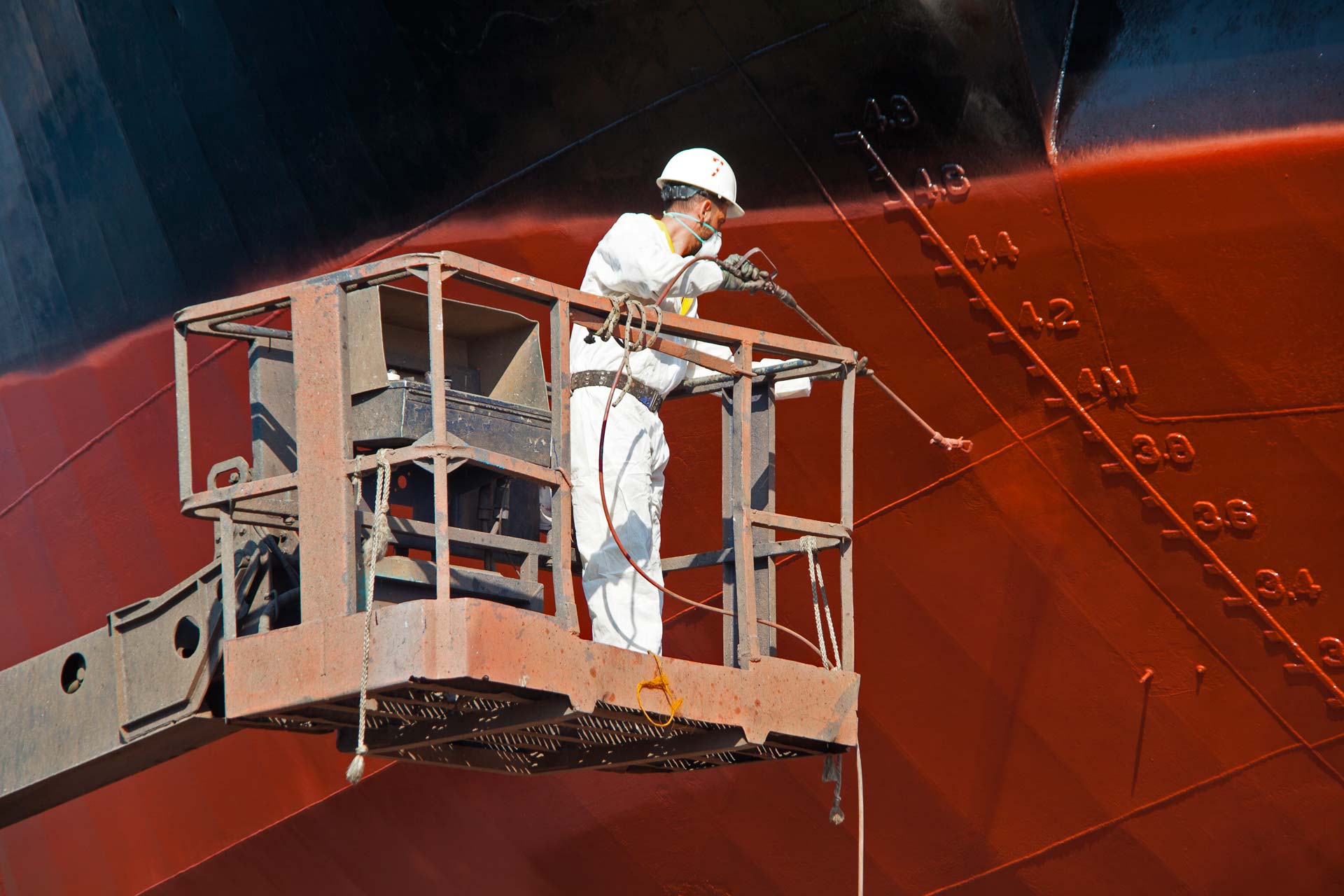 Slideshow - Our People 1 - Worker painting the hull